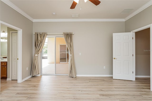 unfurnished room featuring ceiling fan, light hardwood / wood-style flooring, and ornamental molding