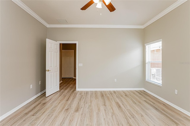 unfurnished room featuring crown molding, ceiling fan, and light wood-type flooring