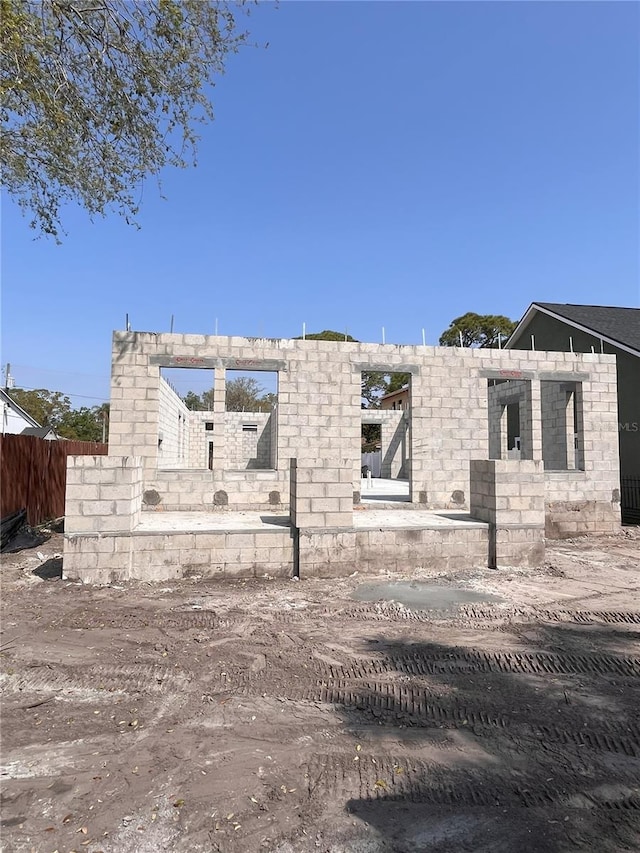 view of side of property with fence