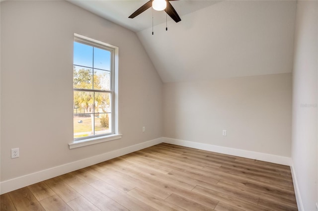 bonus room featuring light hardwood / wood-style floors, ceiling fan, and vaulted ceiling