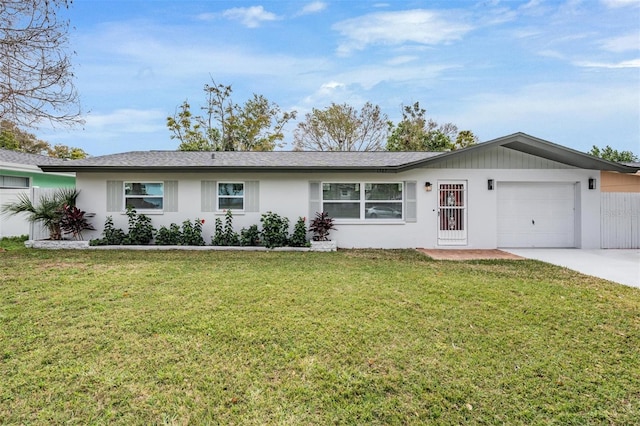 single story home with a front lawn and a garage