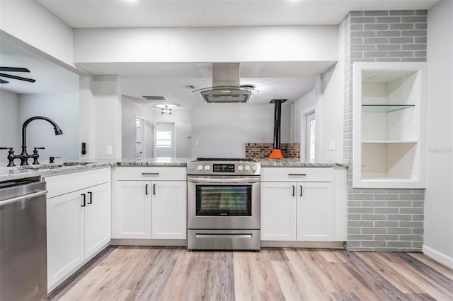 kitchen featuring stainless steel appliances, white cabinetry, island exhaust hood, and light hardwood / wood-style flooring