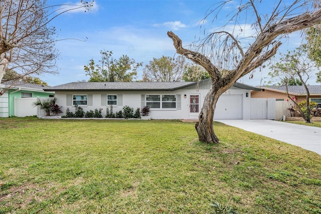 single story home with a front yard and a garage