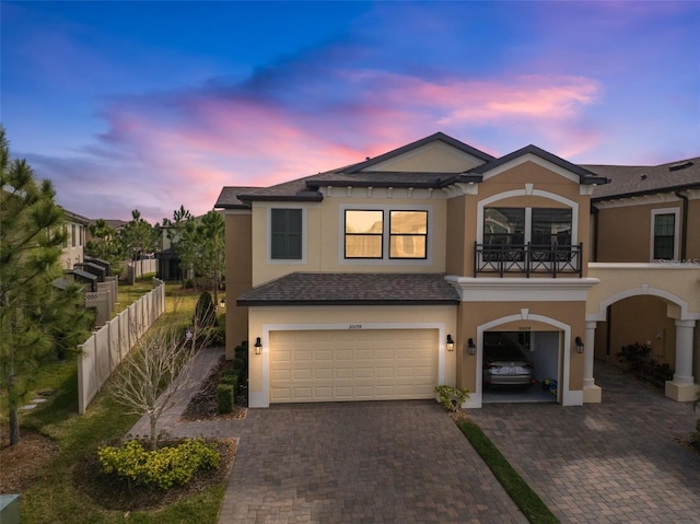 view of front of property with a garage