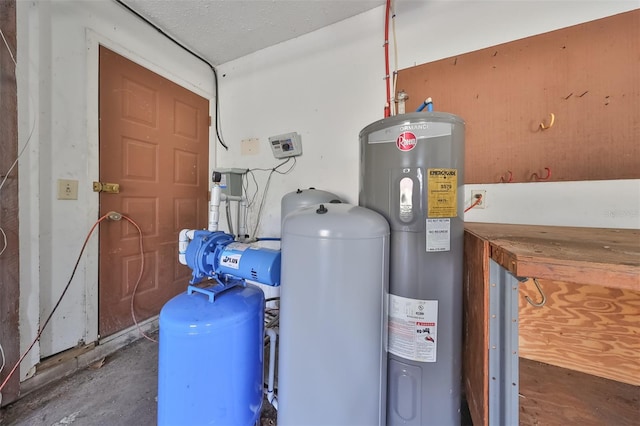 utility room featuring electric water heater