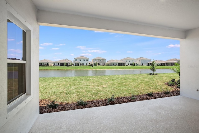 view of yard with a water view