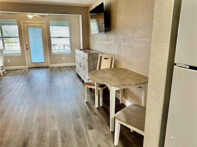 mudroom with wood-type flooring and ceiling fan