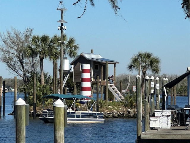 view of dock featuring a water view