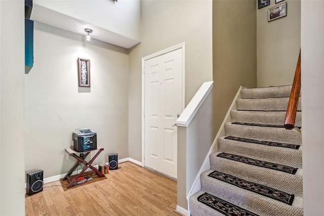 foyer entrance with light wood-type flooring