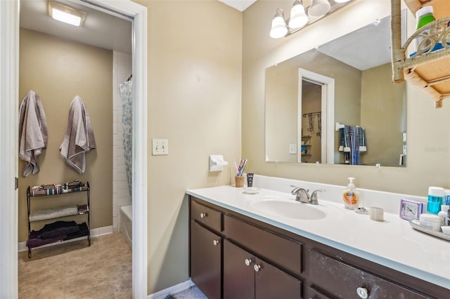 bathroom featuring vanity, tile flooring, and shower / bath combo with shower curtain