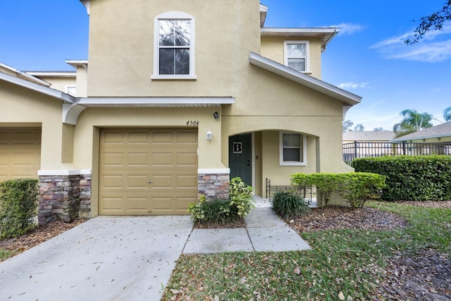 view of front of home with a garage