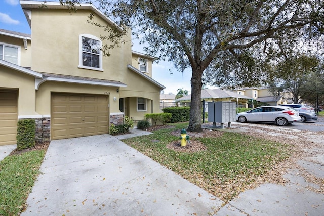 view of front of property featuring a garage