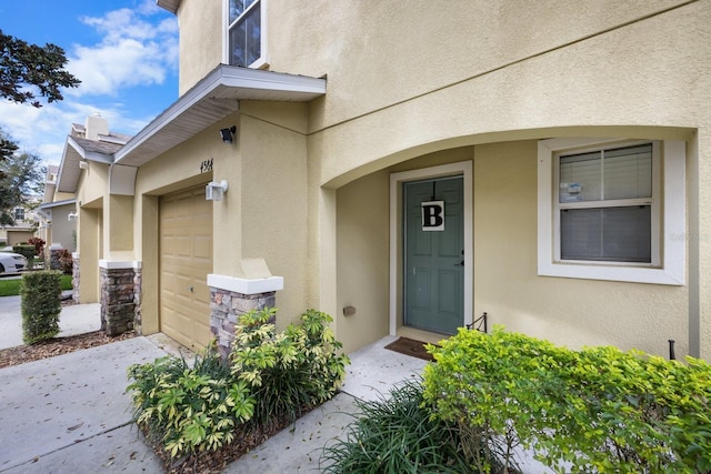 entrance to property with a garage