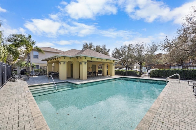 view of pool featuring a patio