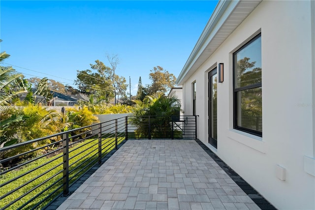 view of patio / terrace with a balcony