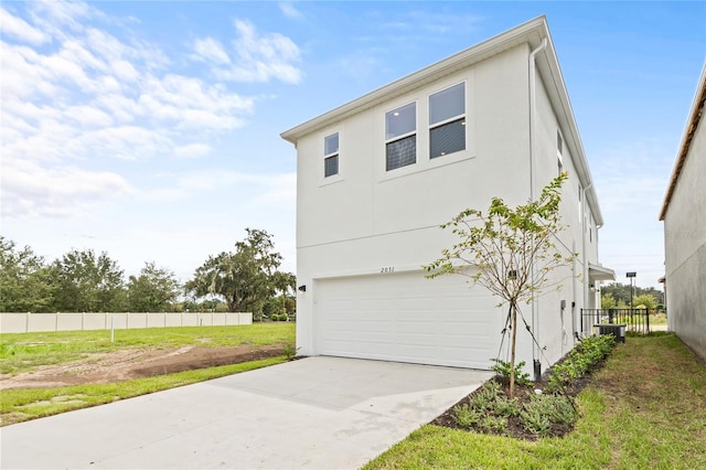 view of side of home with a garage