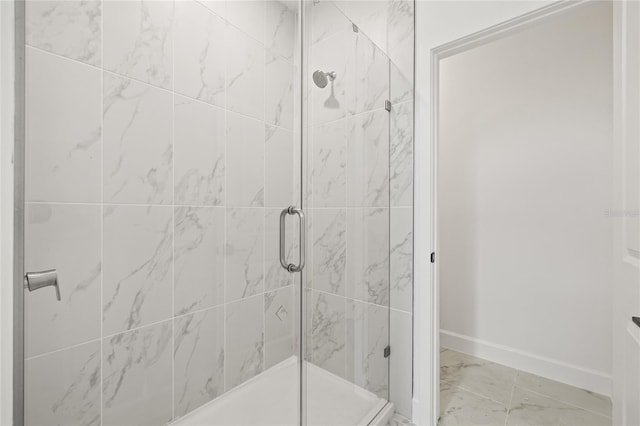 bathroom with an enclosed shower