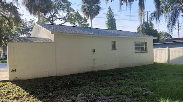 view of property exterior featuring a yard