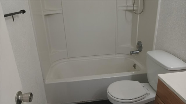 full bathroom with vanity, bathtub / shower combination, and toilet