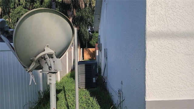 view of side of property featuring cooling unit