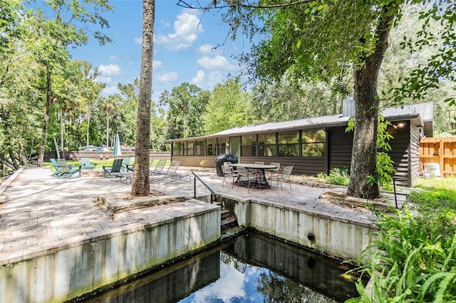 view of dock with a patio