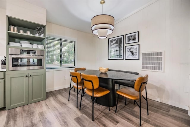 dining room featuring light hardwood / wood-style floors