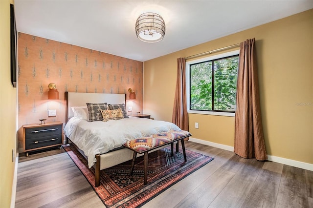 bedroom with hardwood / wood-style floors