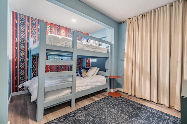 bedroom featuring wood-type flooring