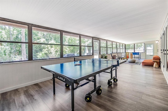 game room with hardwood / wood-style floors