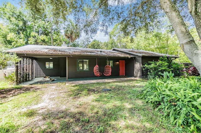 ranch-style house featuring a patio