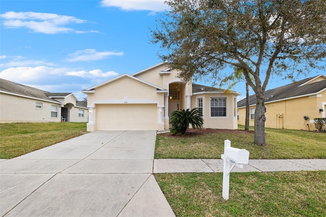 ranch-style home with a front yard and a garage