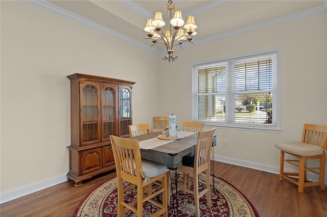 dining space with crown molding, a notable chandelier, and dark hardwood / wood-style flooring