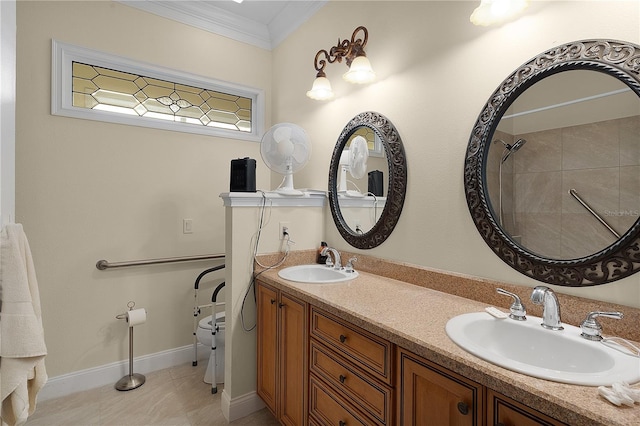 bathroom with double sink vanity, tile floors, and crown molding