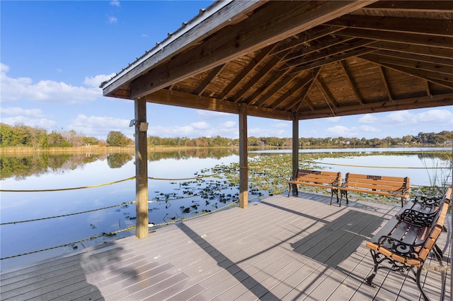 dock area with a water view and a gazebo