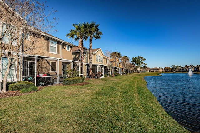 view of yard featuring a water view