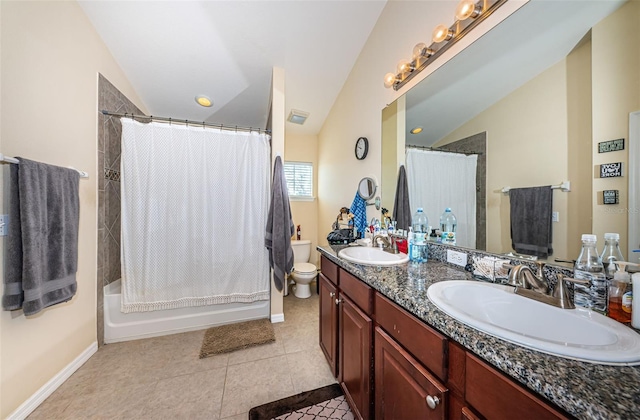 full bathroom with vaulted ceiling, tile patterned flooring, vanity, shower / tub combo, and toilet