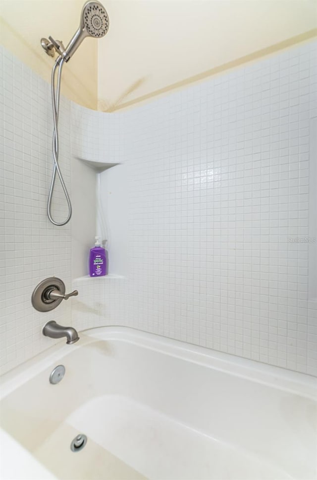 bathroom with shower / bath combination