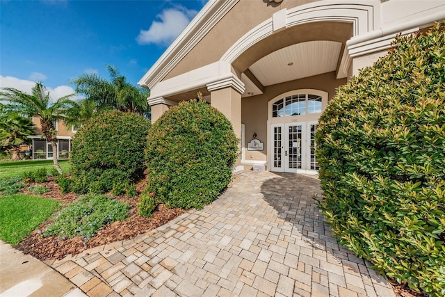 entrance to property featuring french doors