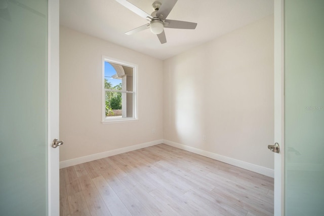 unfurnished room with ceiling fan and light hardwood / wood-style flooring