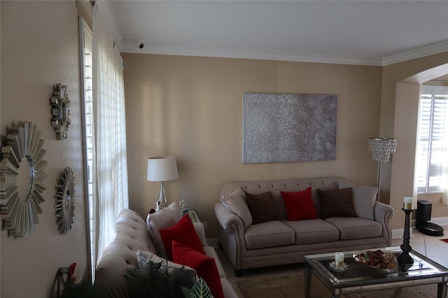 living room featuring tile flooring and ornamental molding