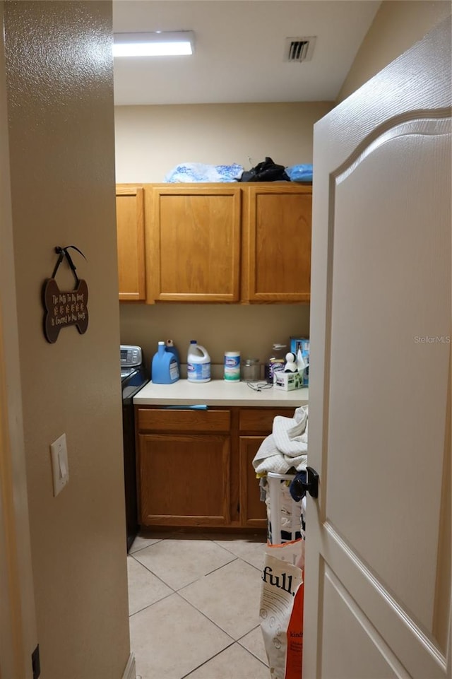 kitchen with light tile flooring