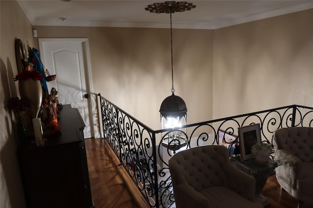 staircase featuring a chandelier and dark hardwood / wood-style floors