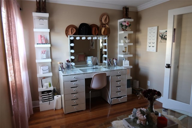 home office with crown molding and dark hardwood / wood-style flooring