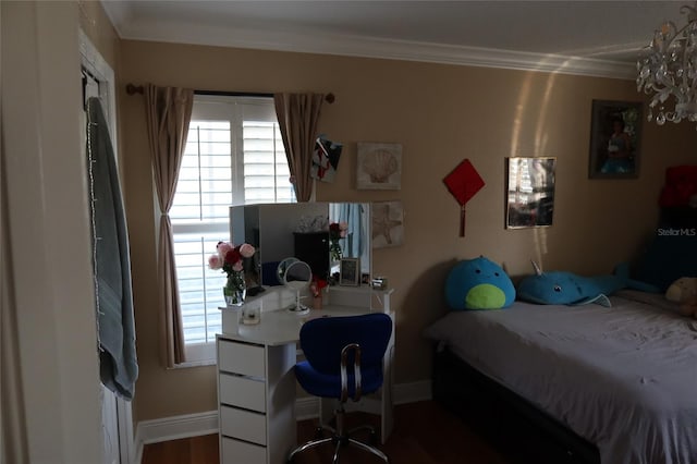 bedroom with dark hardwood / wood-style flooring and ornamental molding