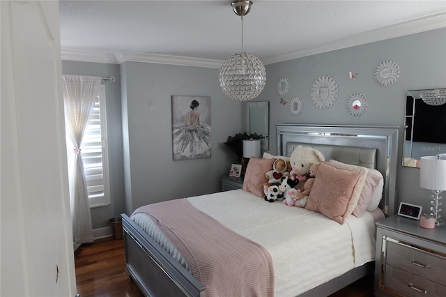 bedroom with ornamental molding, dark wood-type flooring, and an inviting chandelier