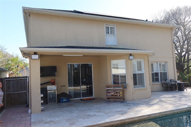 back of house featuring a patio