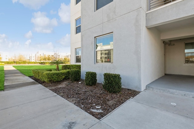 view of property exterior with a balcony