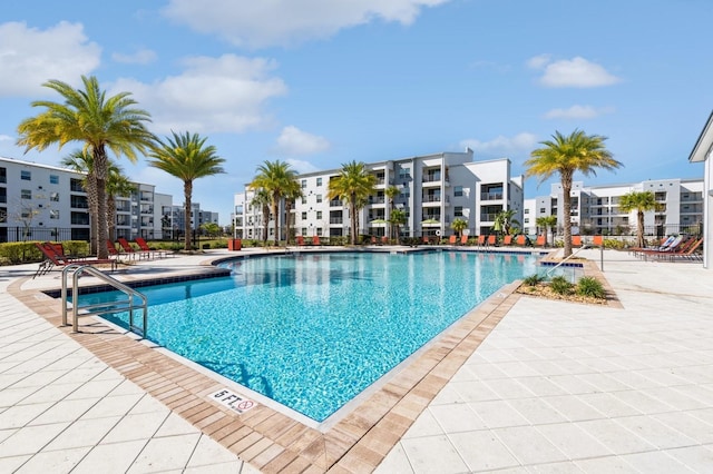 view of pool featuring a patio