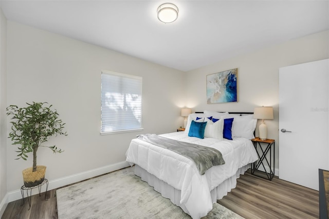 bedroom featuring hardwood / wood-style flooring