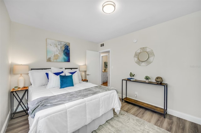 bedroom featuring light hardwood / wood-style floors